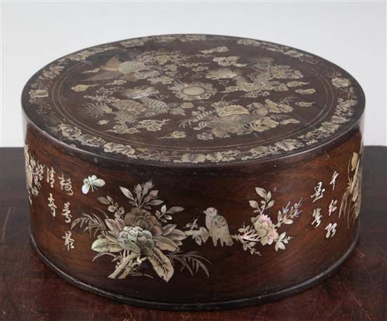 An early 20th century Chinese rosewood and mother of pearl inlaid circular box and cover, diameter 10in.